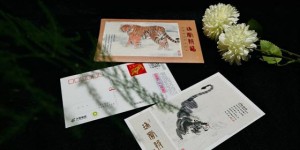 奇思独运写虎态 精美方寸现温情